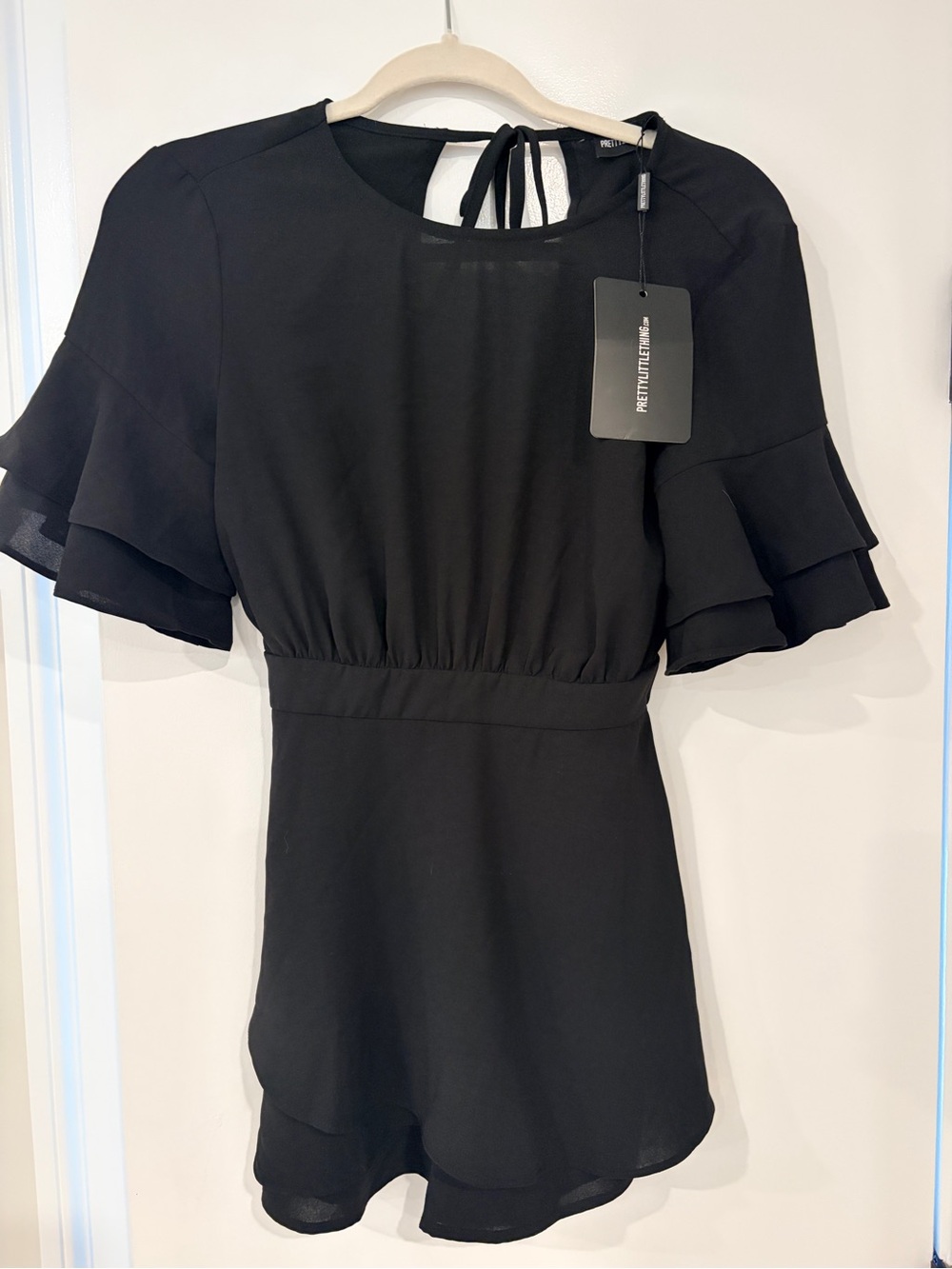 NWT PrettyLittleThing Black Ruffle-Sleeve Mini Romper Dress